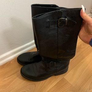 Black mid-calf leather boots